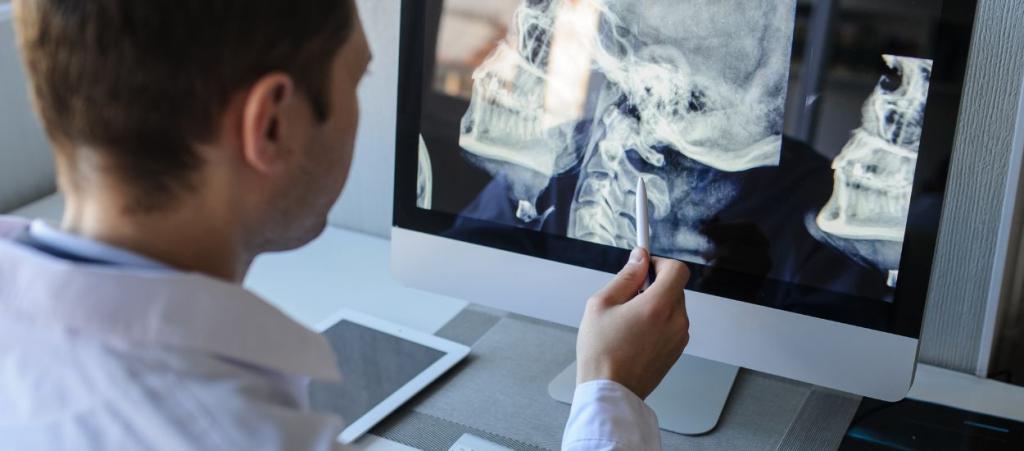Doctor looking at mri image on a computer