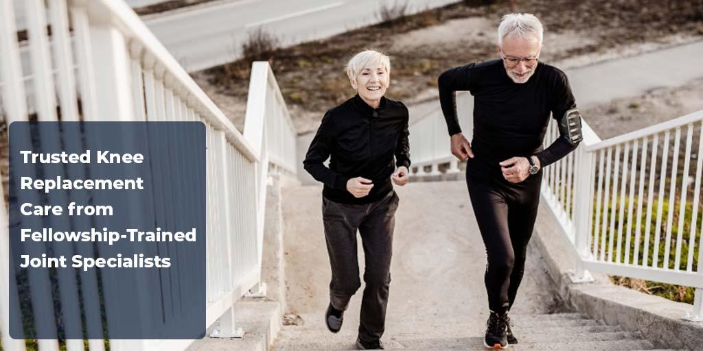 Two people jogging up outdoor steps together, with text promoting trusted knee replacement care from fellowship‑trained joint specialists at Tidewater Orthopaedics.