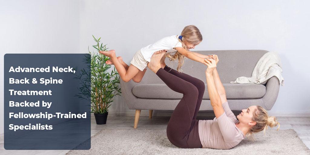 Adult lying on the floor holding a child up with their legs in a playful stretch, alongside text promoting advanced neck, back, and spine treatment from Tidewater Orthopaedics.