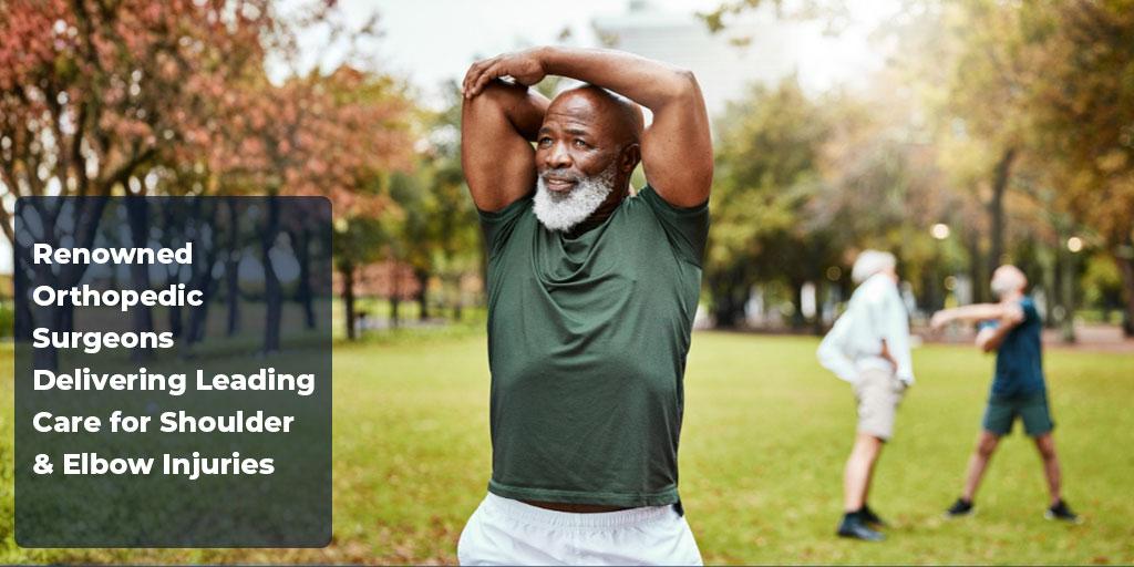 Tidewater Orthopaedics African American Man Stretching Shoulders and Elbows Outside